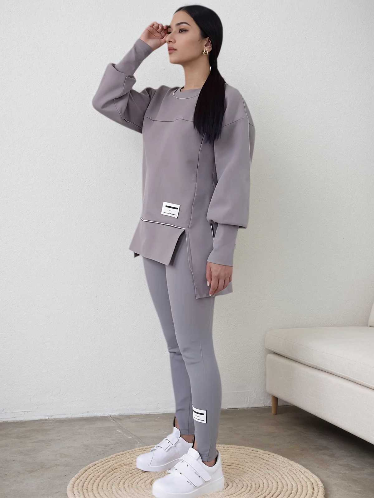 Womens new loose irregular printed sportswear and jogging pants set a fashionable and comfortable twopiece outfitT251022