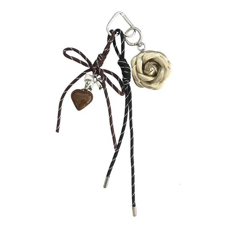 Elegant Camellia Flowers Pu Leather Tassels With Metal Heart Shaped Keychain For Women Trinket Ring Car Bag Pendent Charm X42211 D2510221