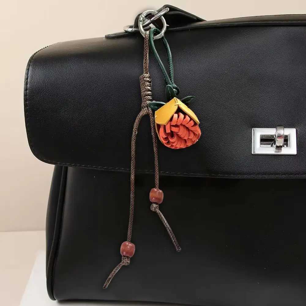 Pinecone Flower Ball Bag Pendant Keychain Bag Charms Car Hanging Tassel Ball Pendant Retro Leather Rope Handmade Bag Ornaments Z251023