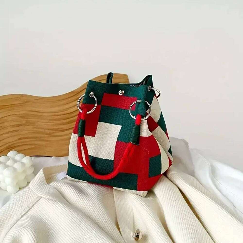 This multi-color knitted retro bucket handbag is simple color-blocked, versatile and easy to carry with you