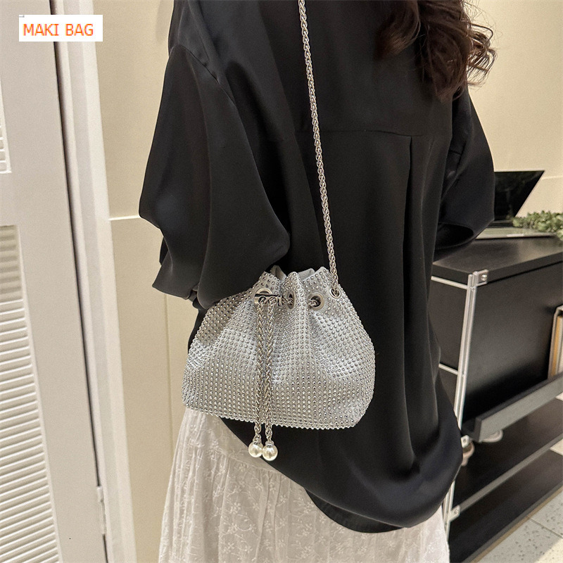 Diamond nail pull rope women's bucket shaped bag, shiny diamond rhinestone full diamond bag, hot selling high-end chain crossbody bag, designer b