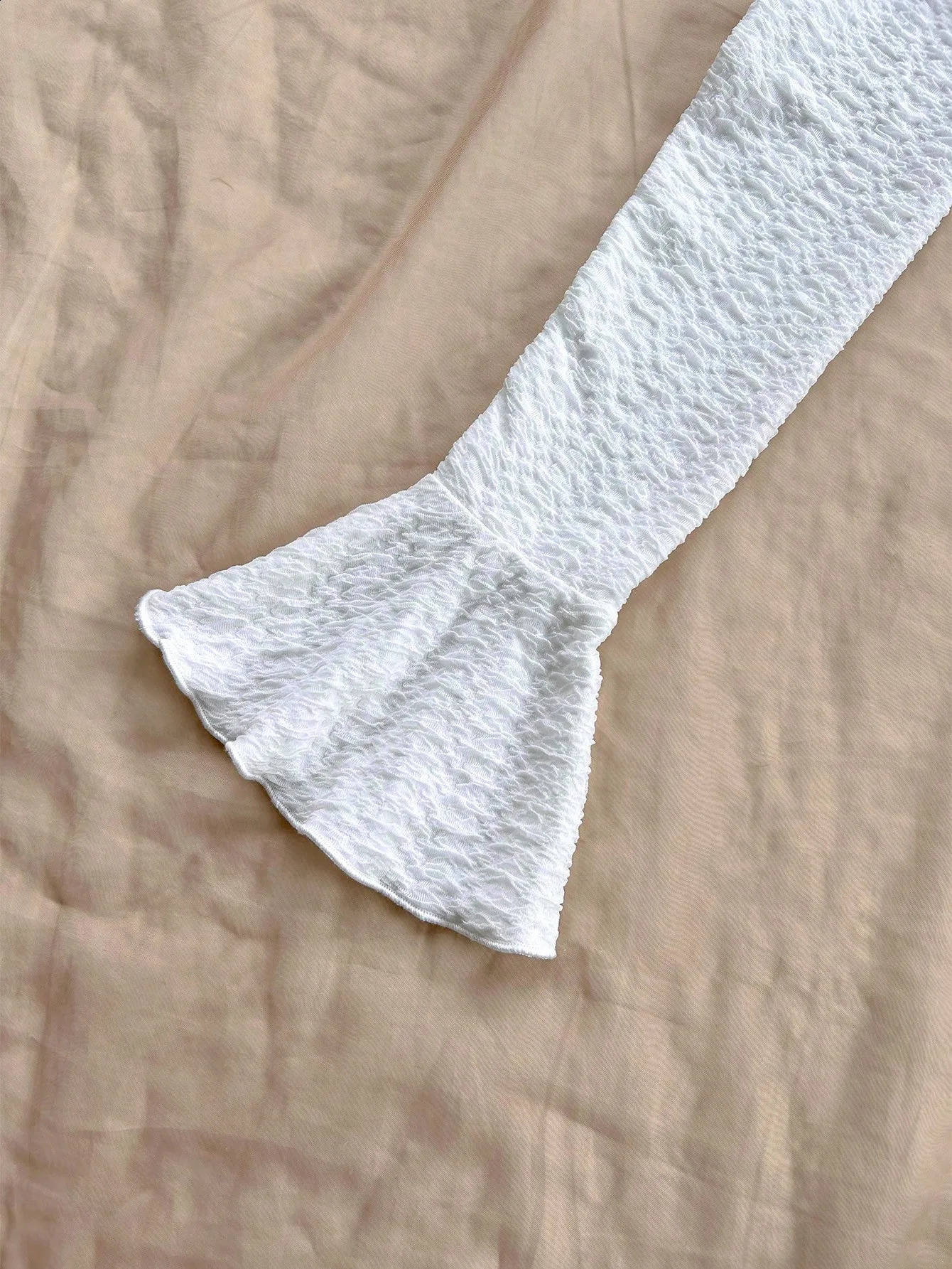 Spring and summer pure horn longsleeved hollowout dress with irregular pleats wrapped buttock to show leg length 251022