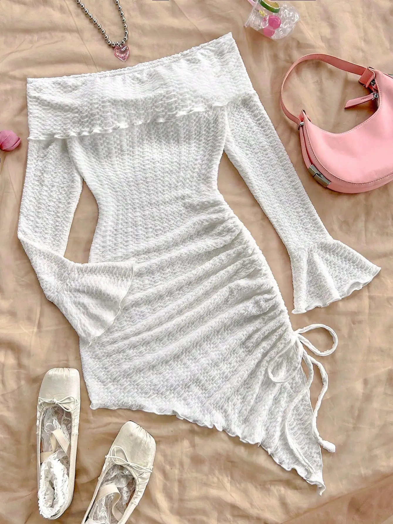 Spring and summer pure horn longsleeved hollowout dress with irregular pleats wrapped buttock to show leg length 251022