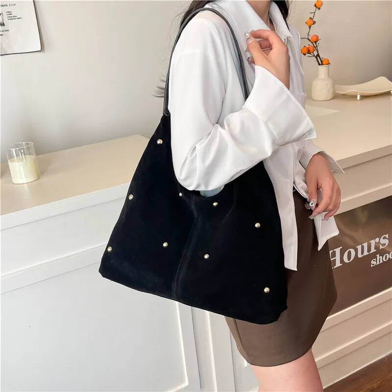 Autumn and winter new luxury handbag with simple style designer bag imitation suede rivet decoration commuting bag women's armpit shoulder bag