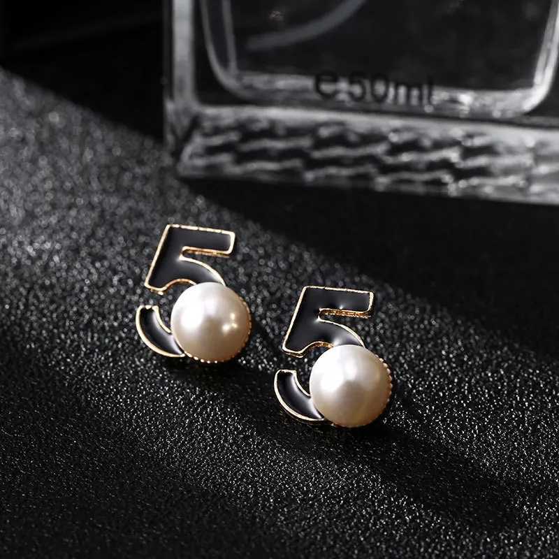 ladies fashion number 5 lia earrings asymmetrical pearl earrings wens popar studs Y251023