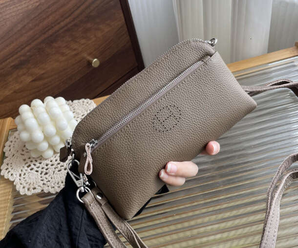 Genuine Leather Fashion Clutch Coin Purse 2025 New Top Layer Cowhide Niche Single Shoulder Crossbody Large Capacity Phone Bag