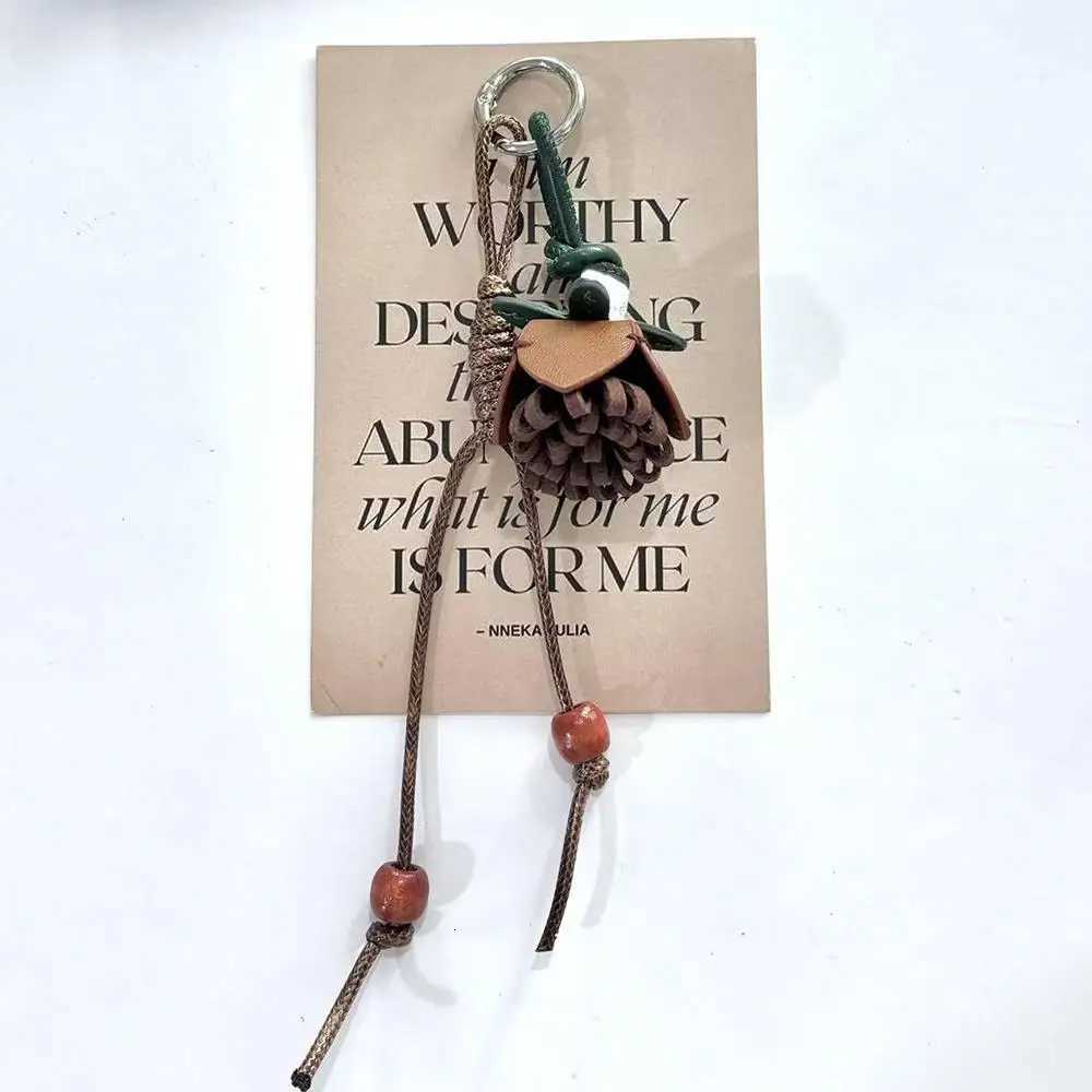 Pinecone Flower Ball Bag Pendant Keychain Bag Charms Car Hanging Tassel Ball Pendant Retro Leather Rope Handmade Bag Ornaments Z251023