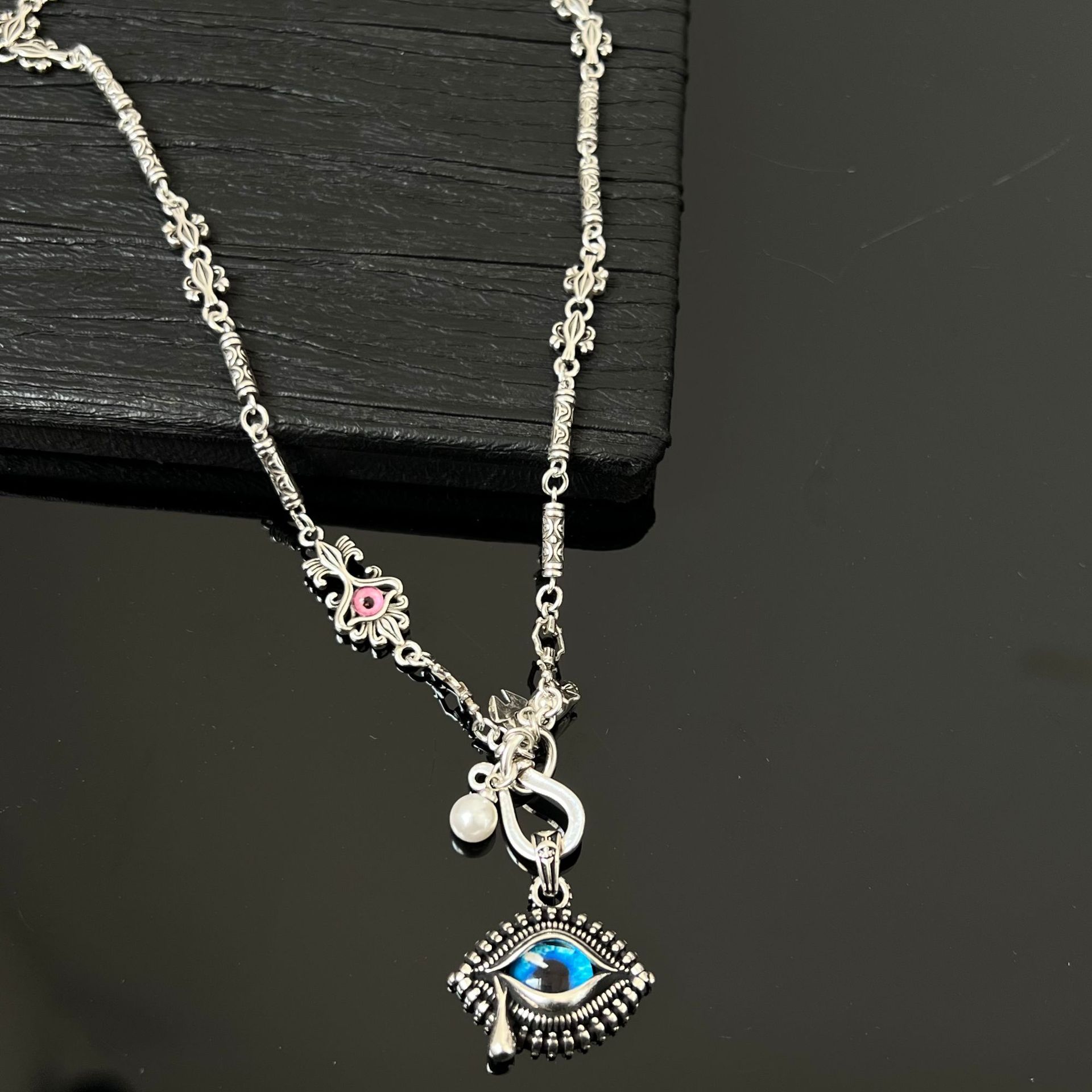 Designer necklace for woman Alloy studded diamond zircon devil's eye pendant necklace, fashionable and exquisite sweater chain Halloween gift
