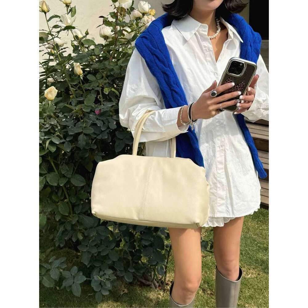 Niche design lazy loose cowhide cloud bag new high-quality versatile handbag for women