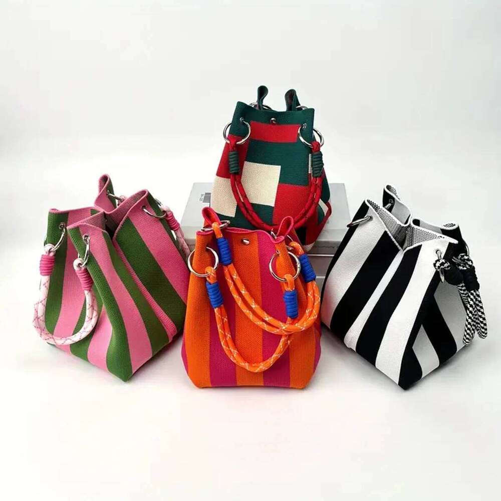 This multi-color knitted retro bucket handbag is simple color-blocked, versatile and easy to carry with you