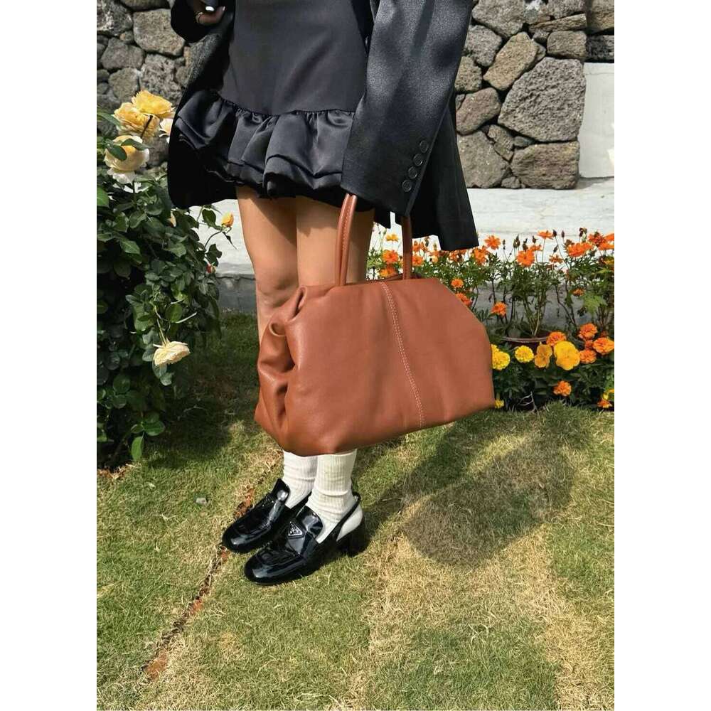 Niche design lazy loose cowhide cloud bag new high-quality versatile handbag for women