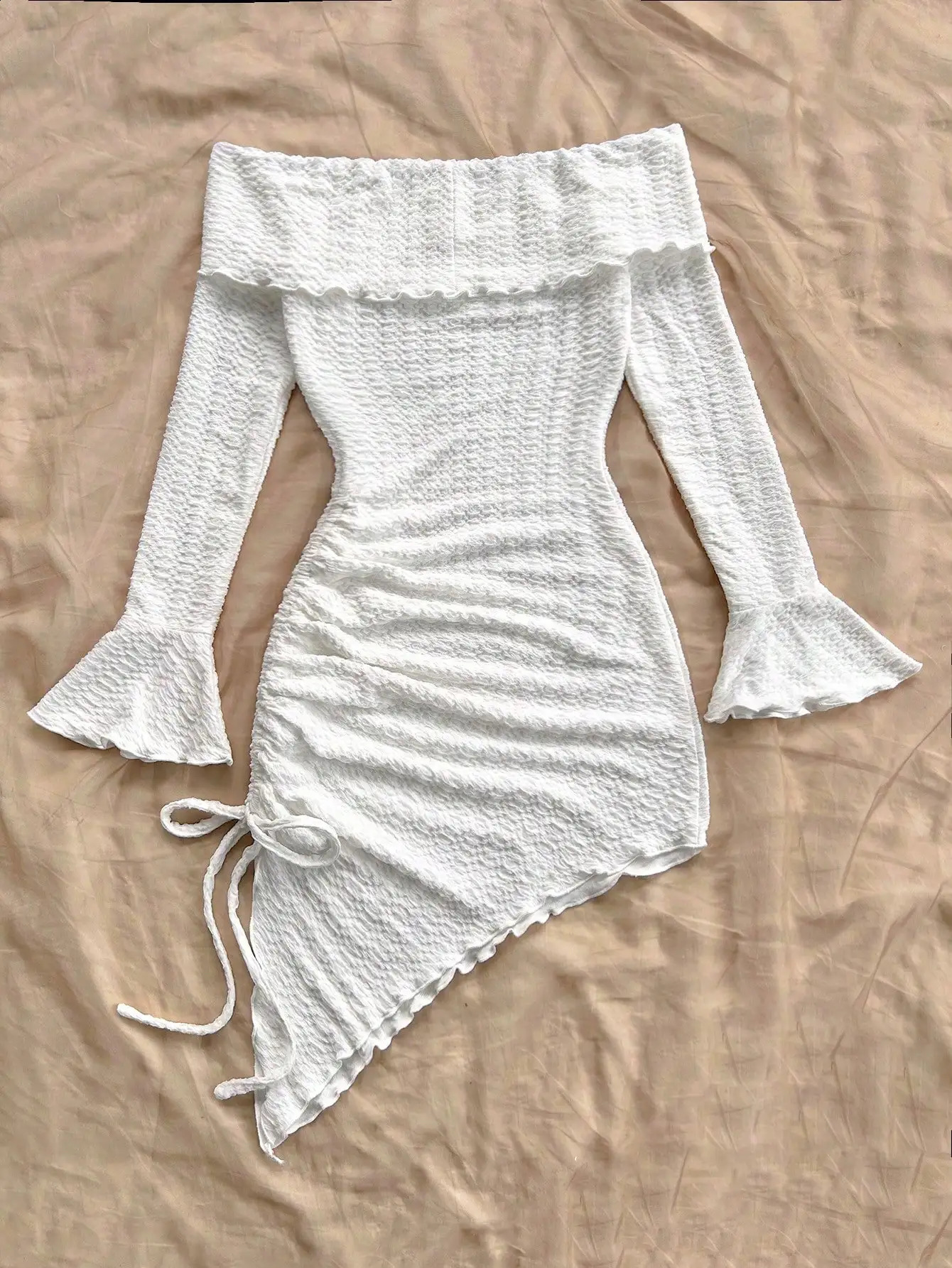 Spring and summer pure horn longsleeved hollowout dress with irregular pleats wrapped buttock to show leg length 251022