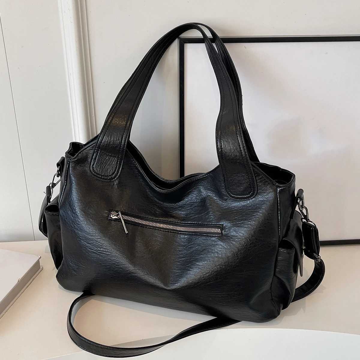 Solid color large capacity womens shoulder bag fashionable simple handheld tote bag commuter personality messenger bagL251023