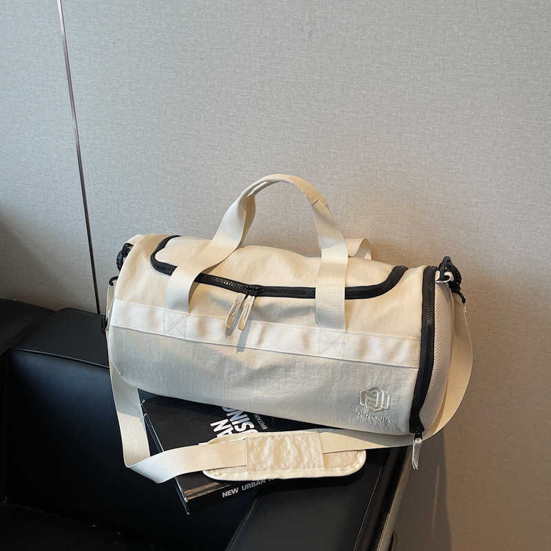 Travel Bag Men Large Capacity Outgoing Handheld Travel Luggage Bag Women Fashionable Dry Wet Separation Cylinder Sports Gym Bag W251023