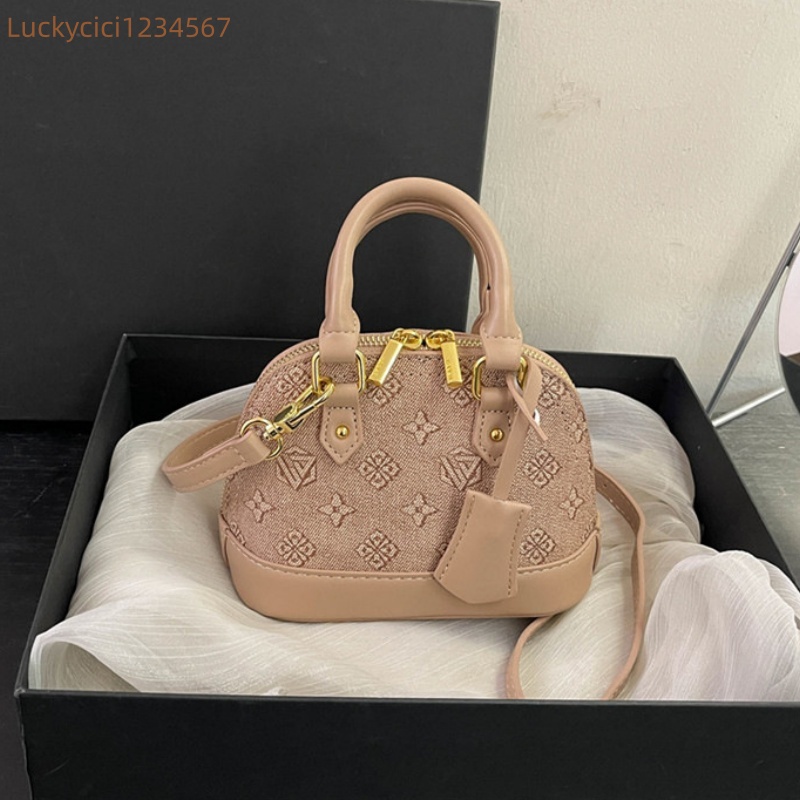 Luxury Bag Designer Bag Fashionable female Advanced printed retro light hand-held vintage flower shell new versatile and temperament crossbody bag sho
