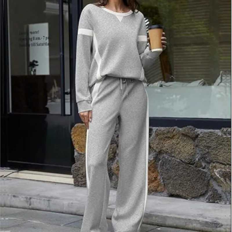 Womens Casual Sports Style Twopiece Fashionable White Striped Patchwork Longsleeved Top Paired With Loose Wideleg Pants SuitT251022