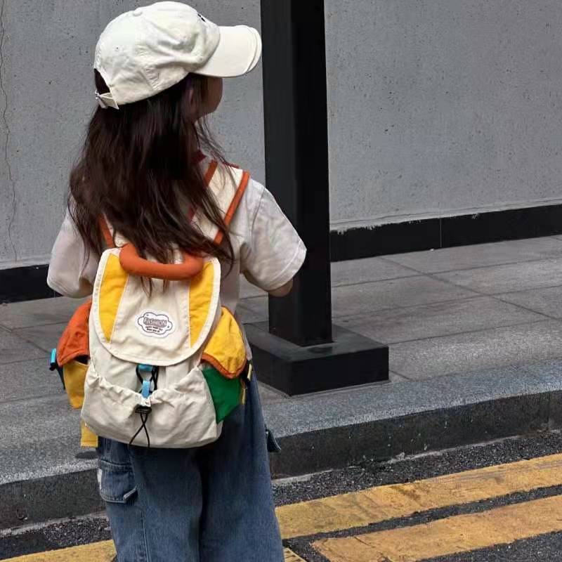 New designer children's backpack for kindergarten boys and girls, outdoor fashion, color blocked hiking, lightweight and fashionable parent-child