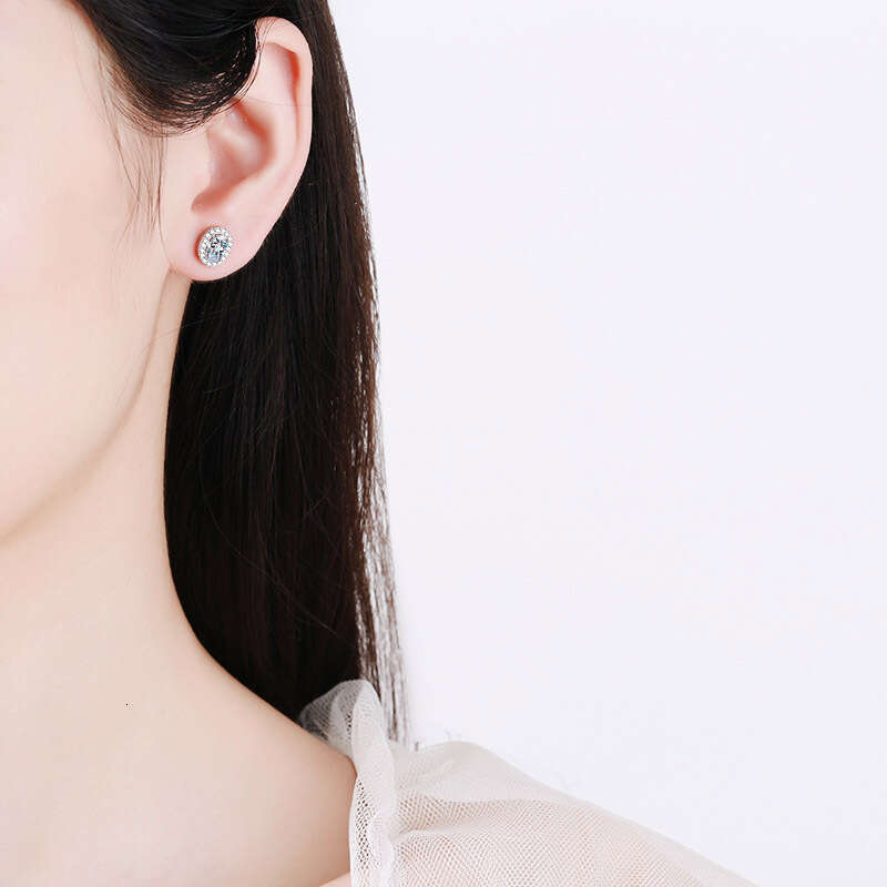 DHCollections-- Sterling Sier for Women, PT950 Plated, Petite Egg-Shaped Inlaid Moissanite Stud Earrings