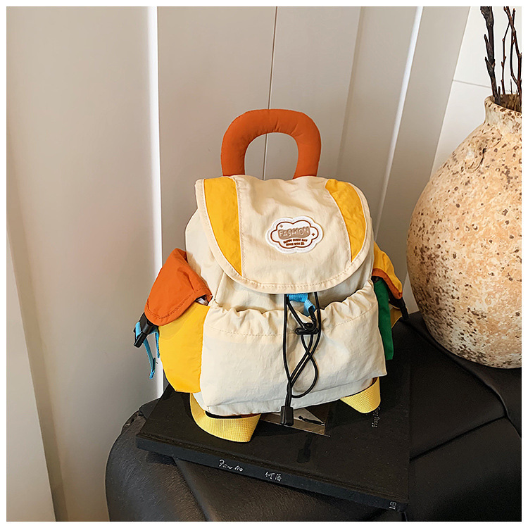 New designer children's backpack for kindergarten boys and girls, outdoor fashion, color blocked hiking, lightweight and fashionable parent-child