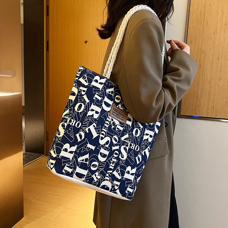 2025 New Women's Large Canvas Bag Designer Fashionable and Elegant Multi functional Handbag