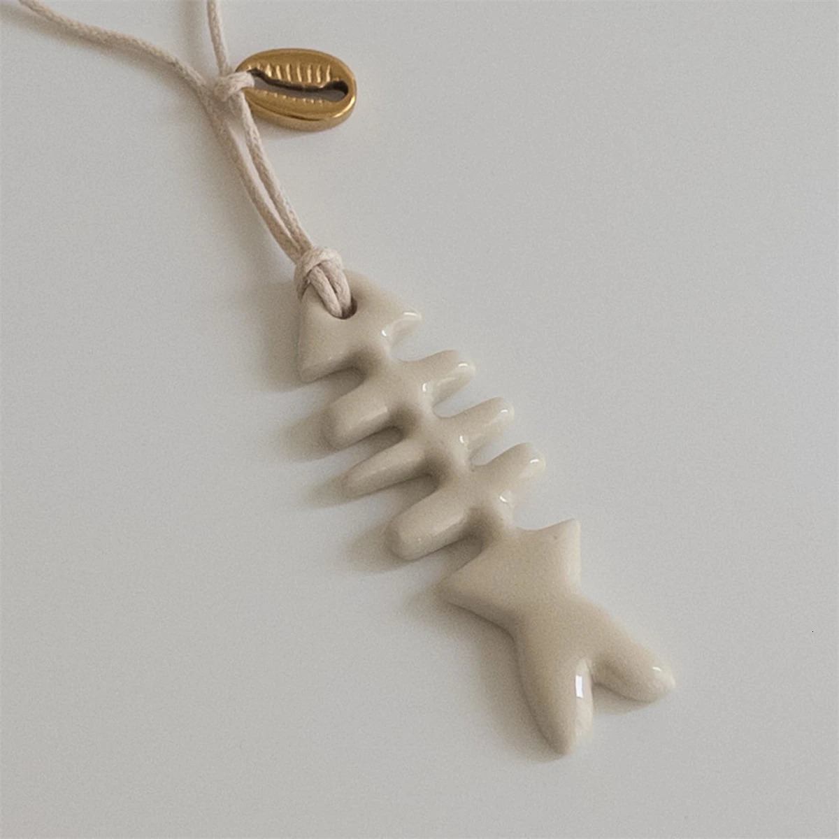 Fresh white minimalist alien fish on the beach fish bone pendant DIY necklace as a gift for women 251016