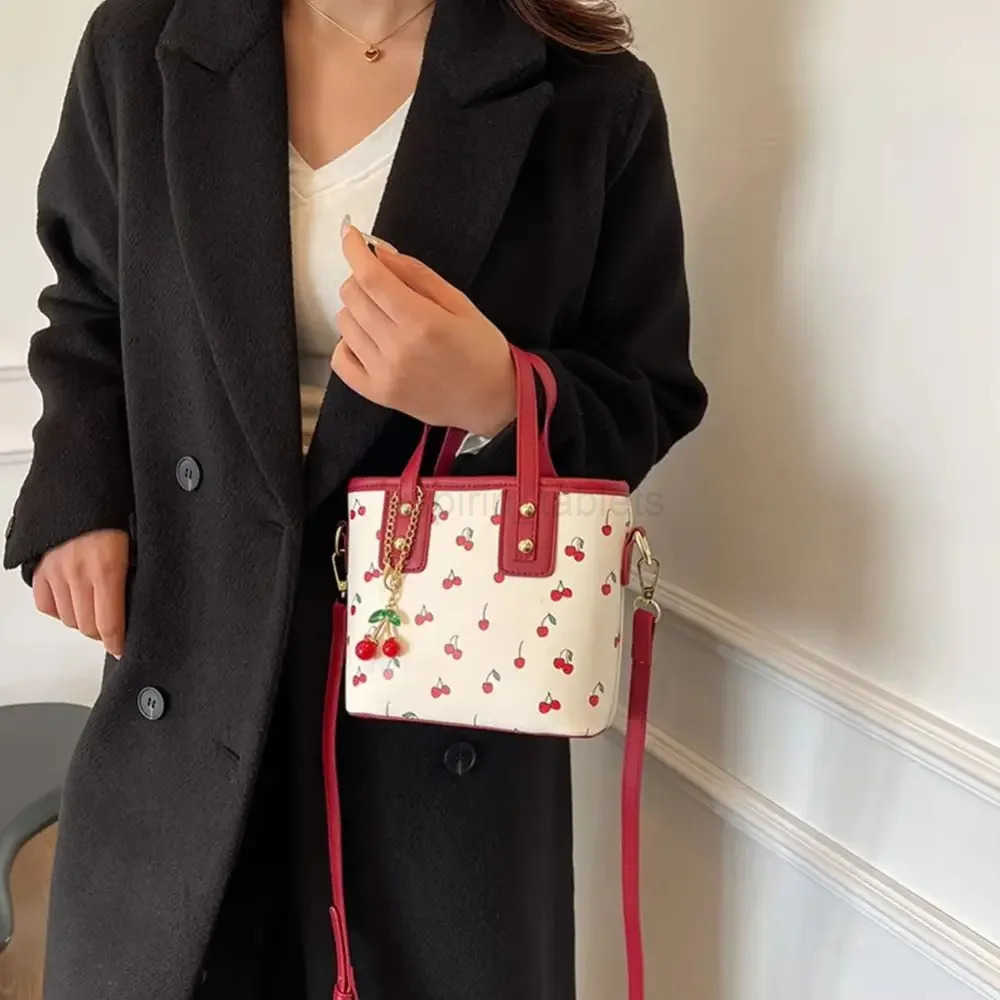 Stylish PU Leather Cherry Shoulder Bag Large Capacity Adjustable Strap Crossbody Bag Comfort with Cherry Pendant Handbag Women M251024