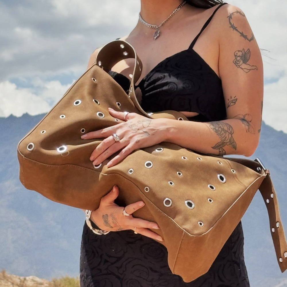 Niche design rivet one-shoulder bag large new style imitation suede hollow out handbag one-shoulder bag