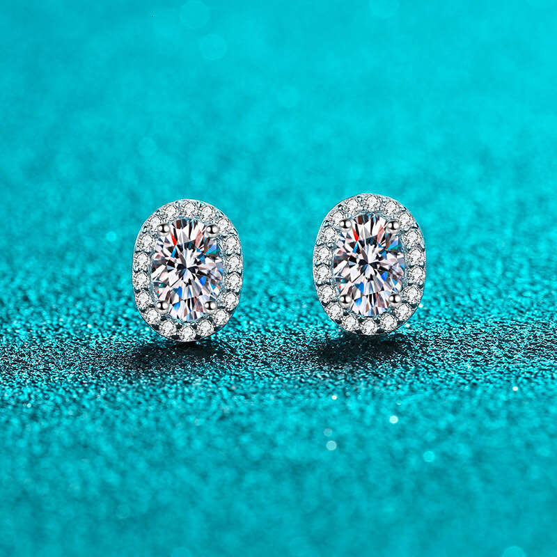 DHCollections-- Sterling Sier for Women, PT950 Plated, Petite Egg-Shaped Inlaid Moissanite Stud Earrings