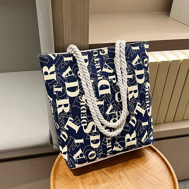 2025 New Women's Large Canvas Bag Designer Fashionable and Elegant Multi functional Handbag