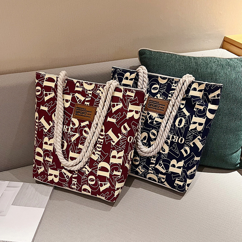 2025 New Women's Large Canvas Bag Designer Fashionable and Elegant Multi functional Handbag