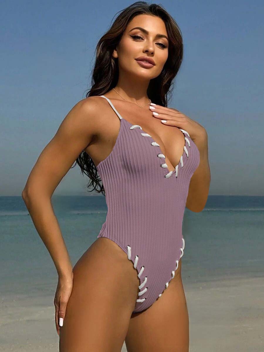 2025 European and American Black Eyed Wear Rope Color blocked Sexy One piece Strap Swimsuit Bikini Female