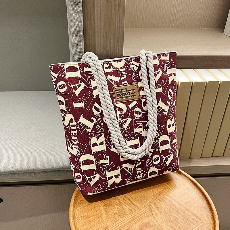2025 New Women's Large Canvas Bag Designer Fashionable and Elegant Multi functional Handbag