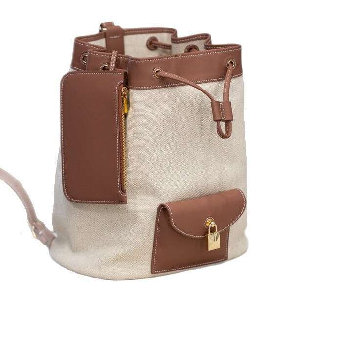 New Genuine Leather Women S Elegant Commuting Versatile Casual Cowhide Drawstring Backpack Simple Lock Buckle Small Bag High Quality