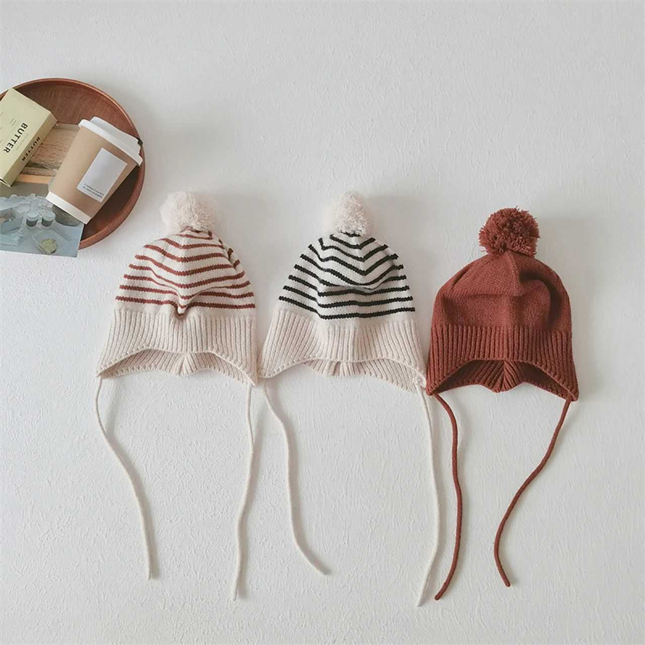Fashion Striped Children Ear Protection Hat Solid Color Woolen Knit Hat 26Year Kids Winter Warm Pullover Cap Plush Ball BeaniesL251024