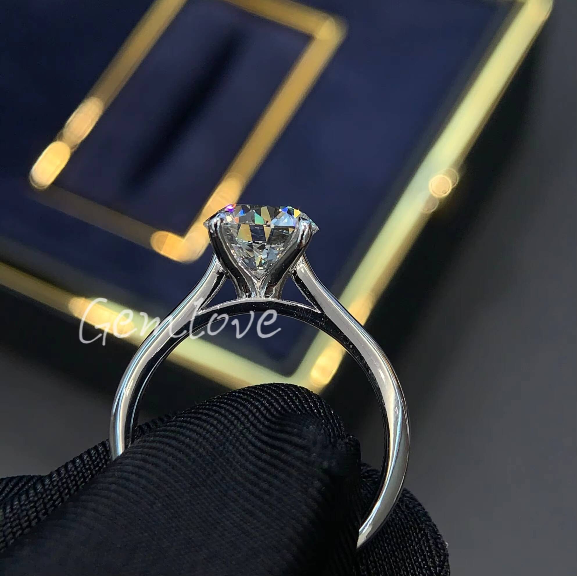 unique 18K gold ring designed exclusively for women featuring a 2carat labgrown round diamond GIAcertified engagement ring