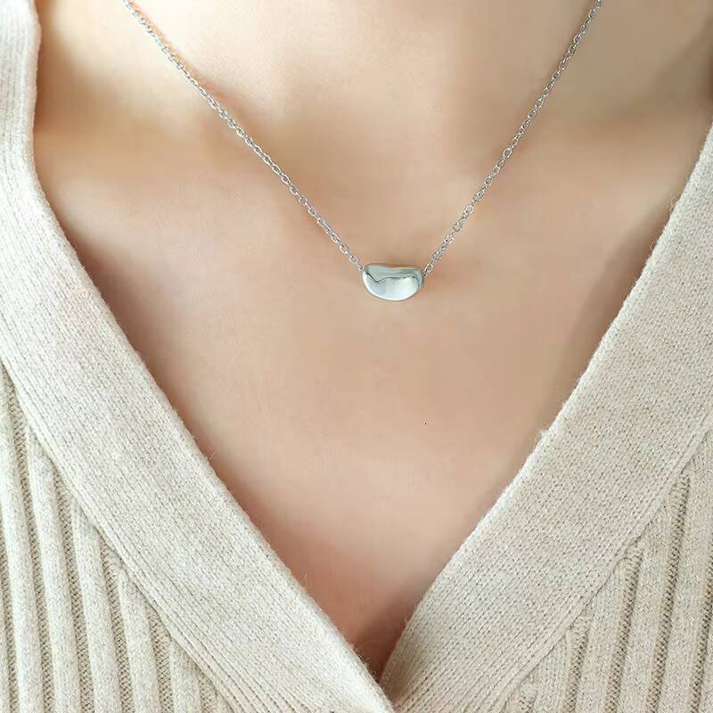 Hot Selling Womens Stainless Steel 18K Gold Plated Necklace Fashion Jewelry Chain with Lucky Golden Bean Pendant Zircon Stone