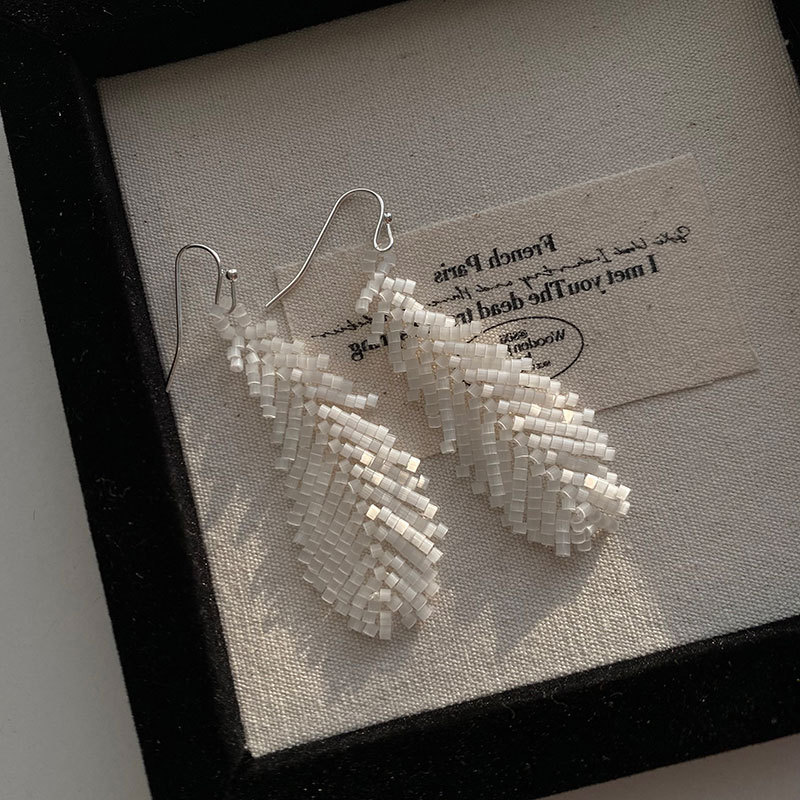 Designer earrings Luxury earrings feather pendant earrings silver needle inlaid with diamonds zircon light luxury metal earrings diamond earrings free