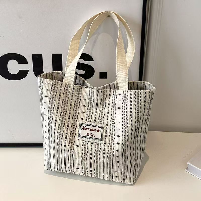 2025 Designer Fashion Canvas Bag Women's Shoulder Bag Handbag Commuter Backpack