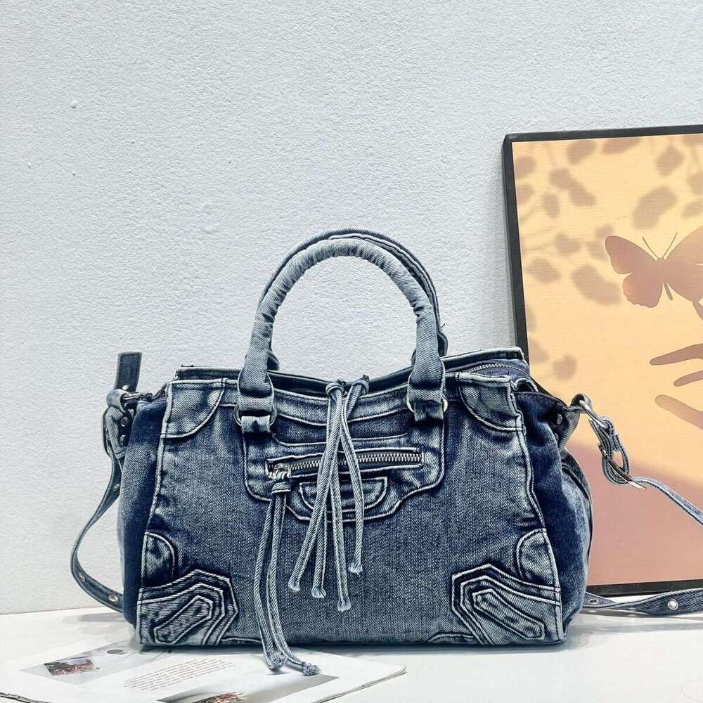 New Women's High-End Denim Motorcycle Tassel Rivet Handbag Fashion Versatile Washed Fabric Crossbody Bag for Women