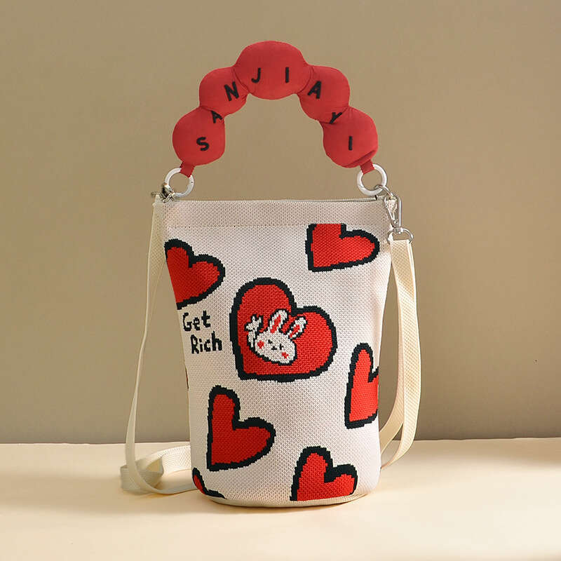 Hot Selling Flying Weave Cartoon Jacquard Bucket Crossbody Women's Fashion Knitted Commuter Phone Small Shoulder Bag