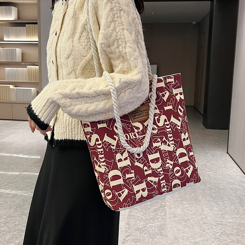 2025 New Women's Large Canvas Bag Designer Fashionable and Elegant Multi functional Handbag