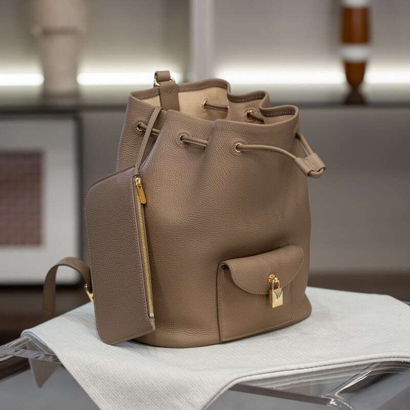 New Genuine Leather Women S Elegant Commuting Versatile Casual Cowhide Drawstring Backpack Simple Lock Buckle Small Bag High Quality