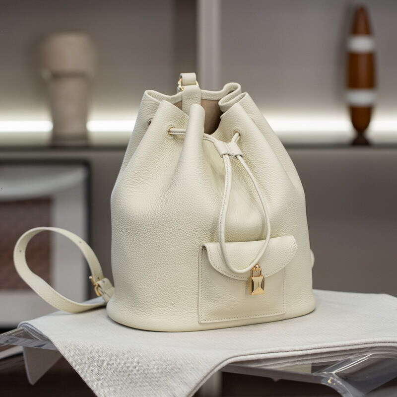 New Genuine Leather Women S Elegant Commuting Versatile Casual Cowhide Drawstring Backpack Simple Lock Buckle Small Bag High Quality
