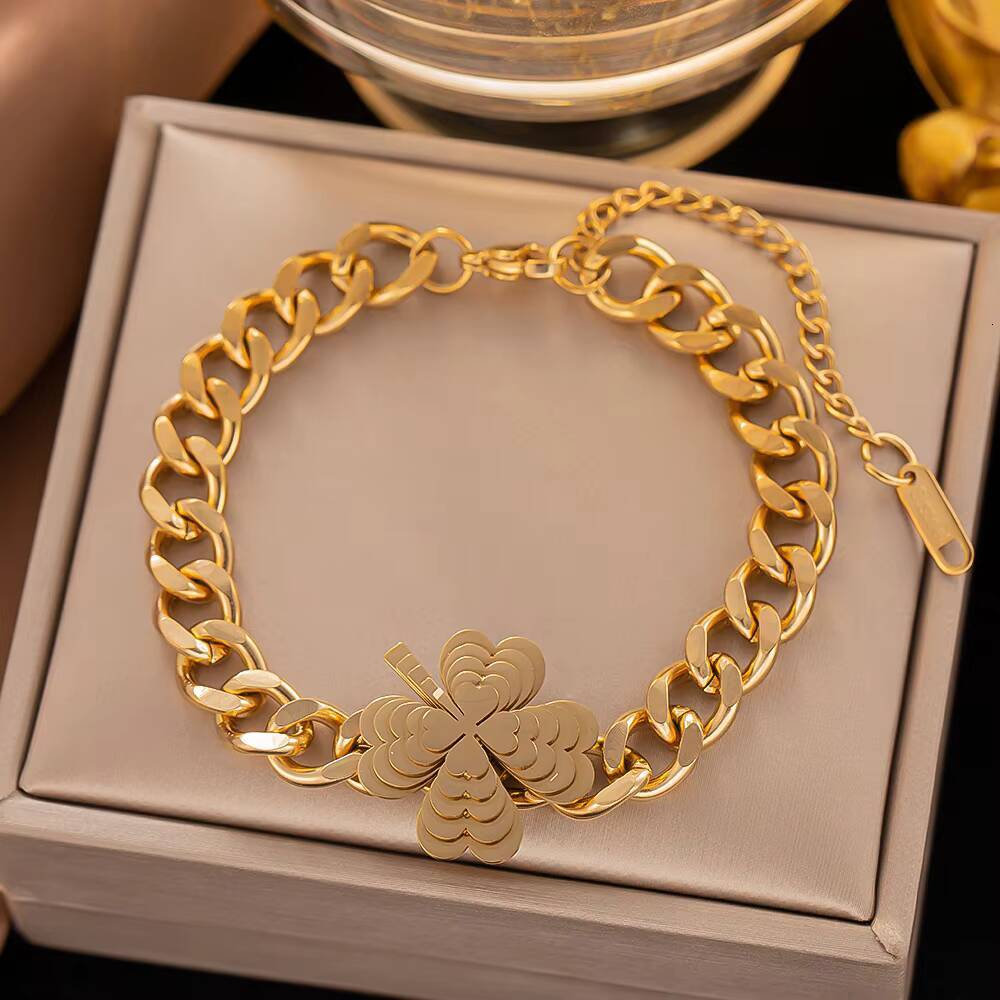 High Quality Wholesale 2024 New European and American HipHop Star Butterfly Flower Cuban Titanium Steel Bracelet