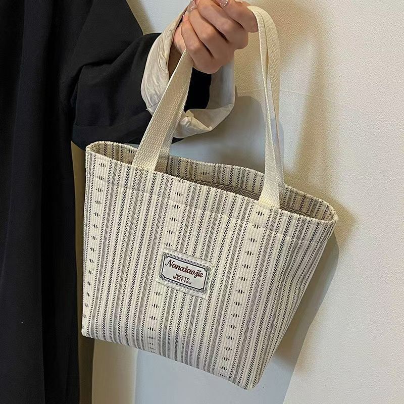 2025 Designer Fashion Canvas Bag Women's Shoulder Bag Handbag Commuter Backpack