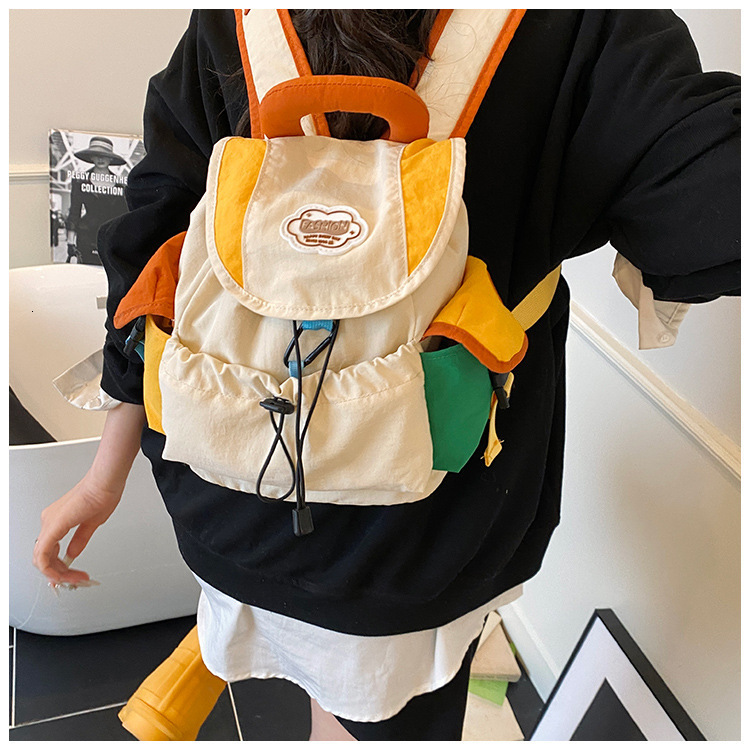 New designer children's backpack for kindergarten boys and girls, outdoor fashion, color blocked hiking, lightweight and fashionable parent-child