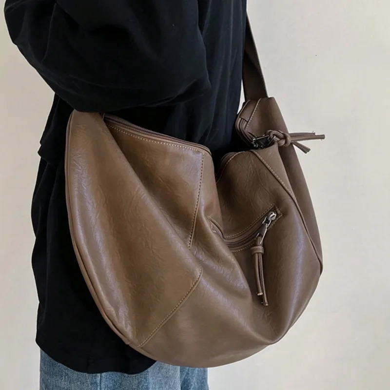 Stylish Dumpling Shaped PU Crossbody Bag for Men Suitable for Casual Outings and Large Capacity Needs 251023