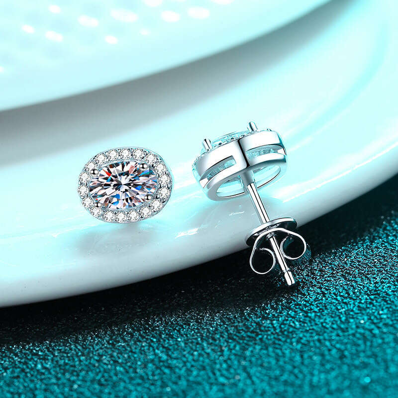 DHCollections-- Sterling Sier for Women, PT950 Plated, Petite Egg-Shaped Inlaid Moissanite Stud Earrings