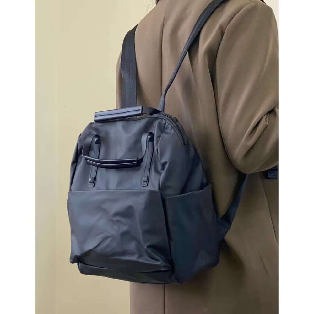 Waterproof Nylon New Trendy Travel Backpack Fashion Versatile Handheld Lightweight Commuter School Bag For Women High Quality