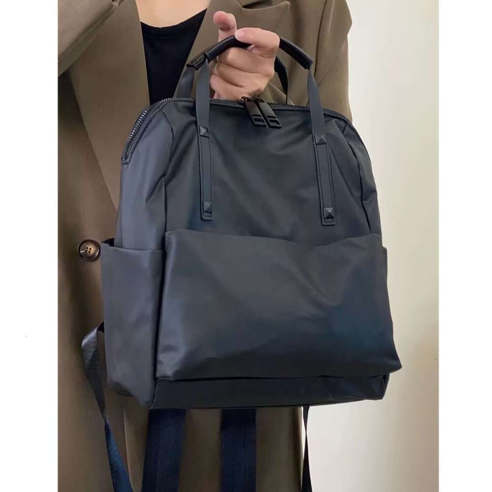 Waterproof Nylon New Trendy Travel Backpack Fashion Versatile Handheld Lightweight Commuter School Bag For Women High Quality